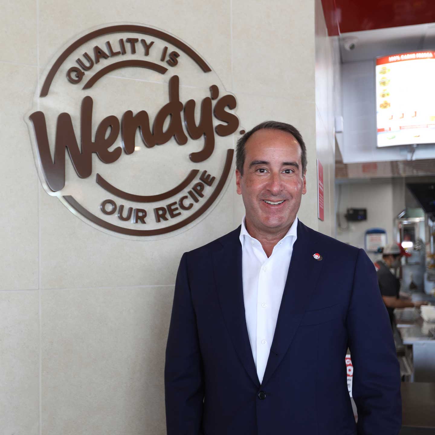 Jorge Colón Gerena in front of Wendy's logo