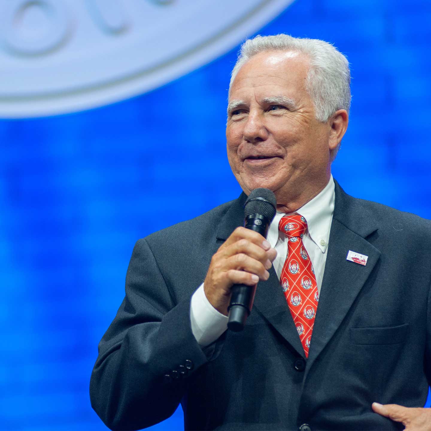 Raul Dominguez speaking at microphone