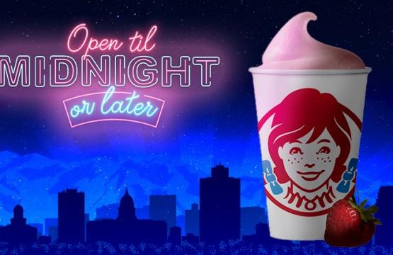 Wendy's Strawberry Frosty with "Open 'til Midnight or Later" text