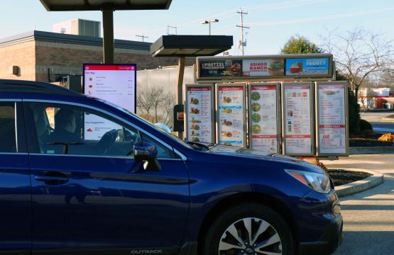 Car in Wendy's Drive-Thru with customer talking to Wendy's FreshAI