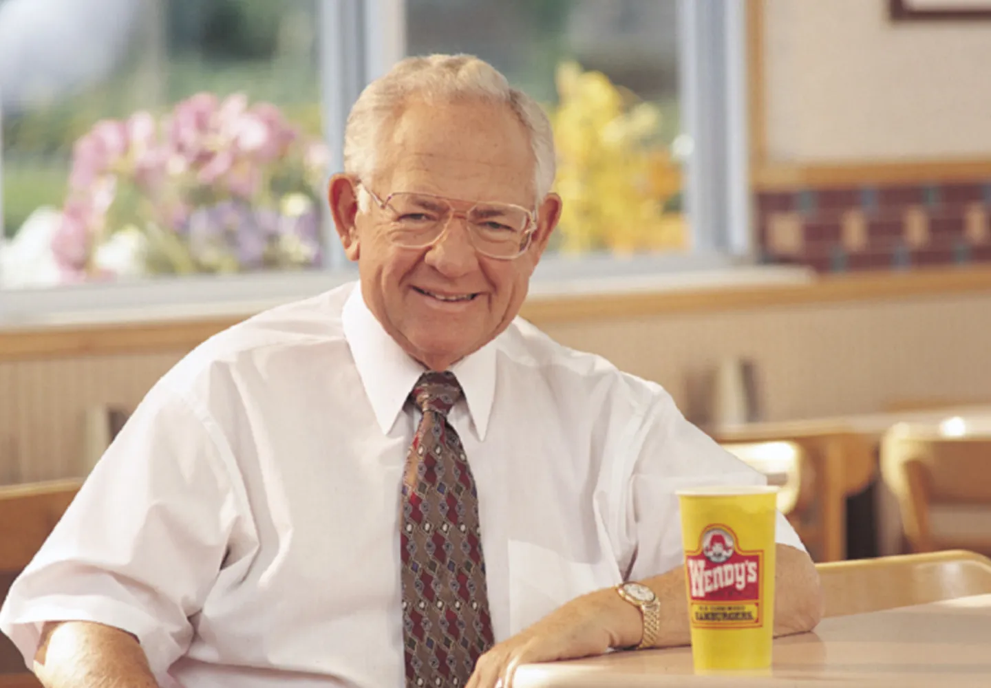 Dave sitting at a table in Wendy's